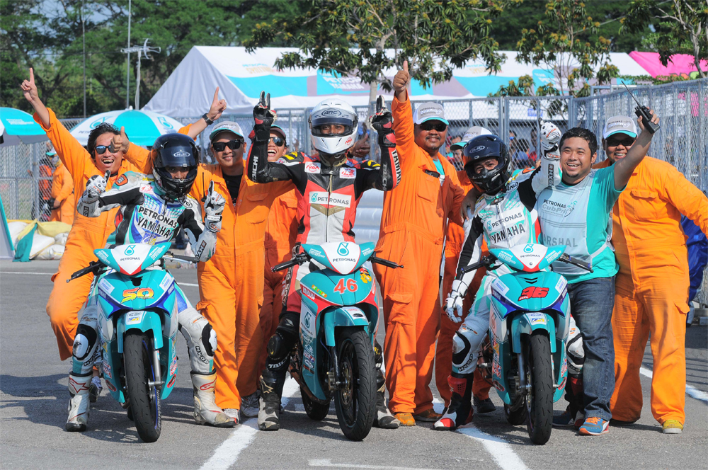 PETRONAS AAM Malaysian Cub Prix Championship - (50)Ahmad Afif Amran (46)Ahmad Fazli Sham and (36)Mohd Affendi Rosli celebrating their win race marshalls
