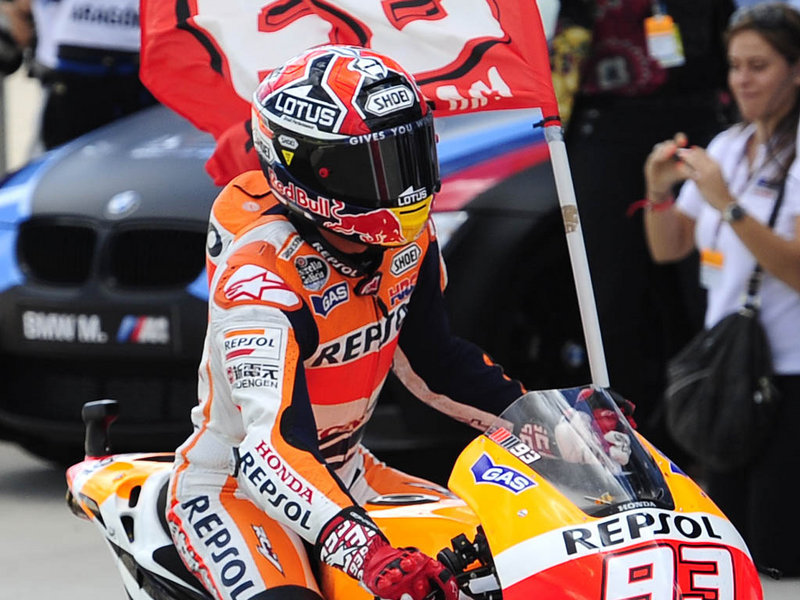 Recently crowned world champion Marc Marquez broke another record by romping to his 12th win of the season in an eventful Malaysian Grand Prix on Sunday.
