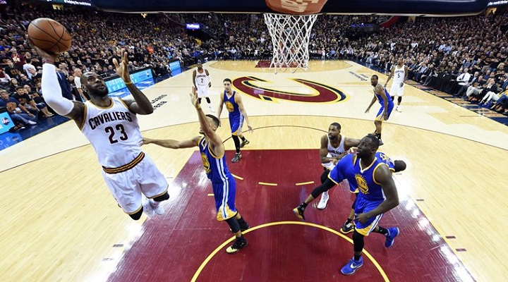 Jun 16, 2016; Cleveland, OH, USA; Cleveland Cavaliers forward LeBron James (23) shoots the ball against Golden State Warriors guard Stephen Curry (30) in game six of the NBA Finals at Quicken Loans Arena. Mandatory Credit: Bob Donnan-USA TODAY Sports