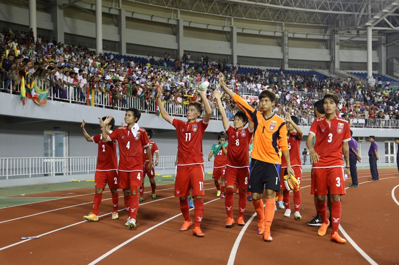 Myanmar players wave to fans