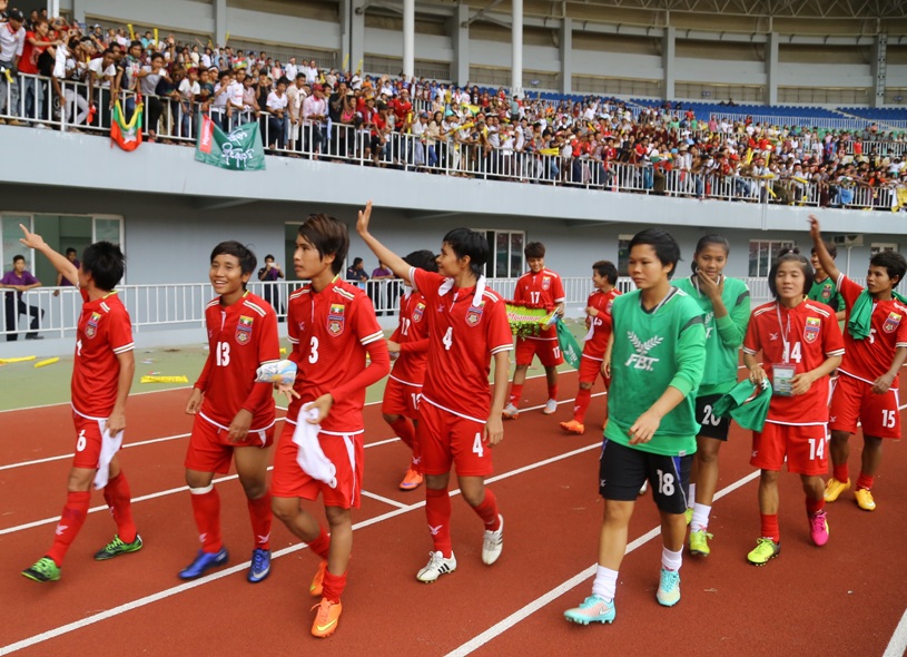 Myanmar players wave to fans